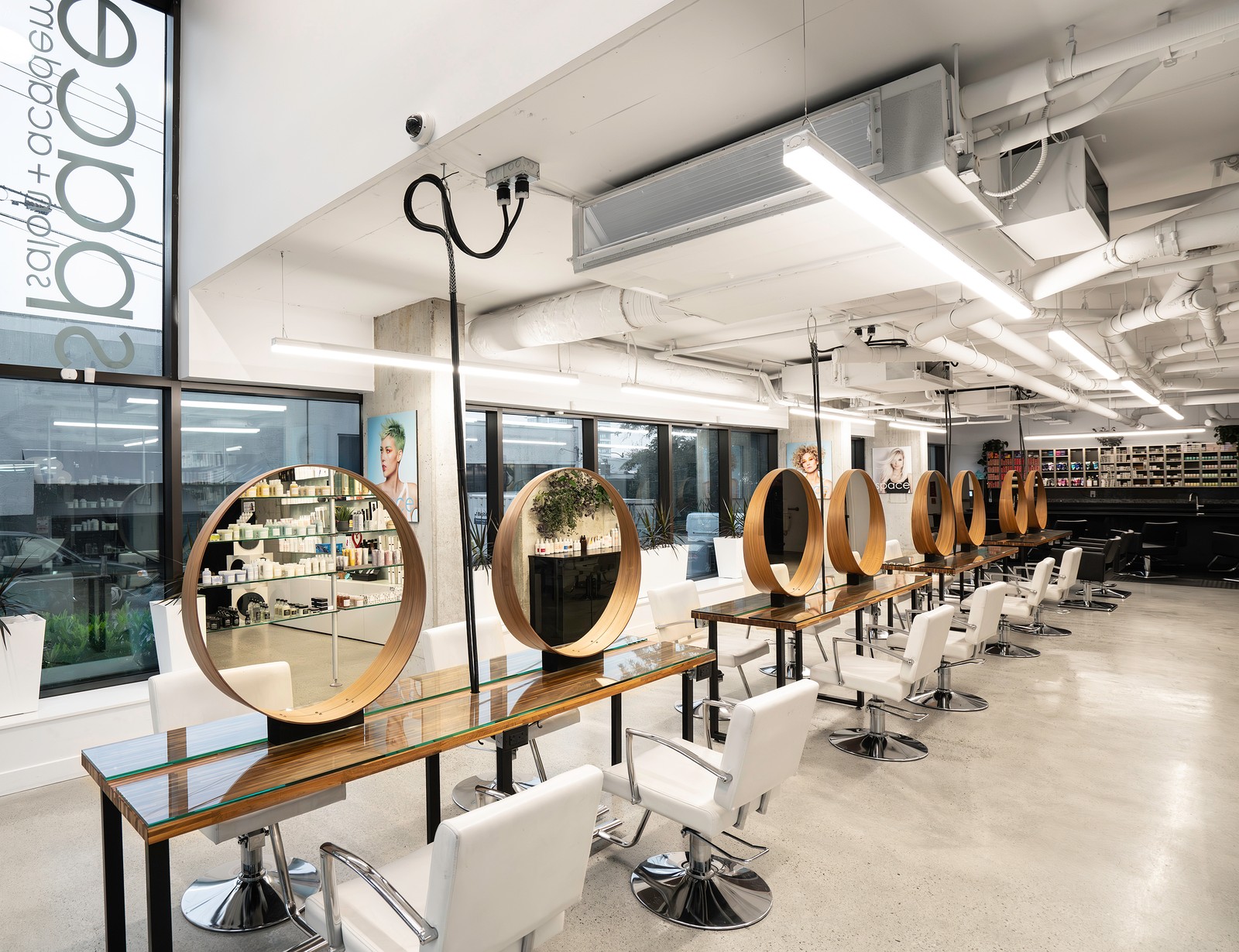 Aveda Vancouver salon floor with walnut mirrors